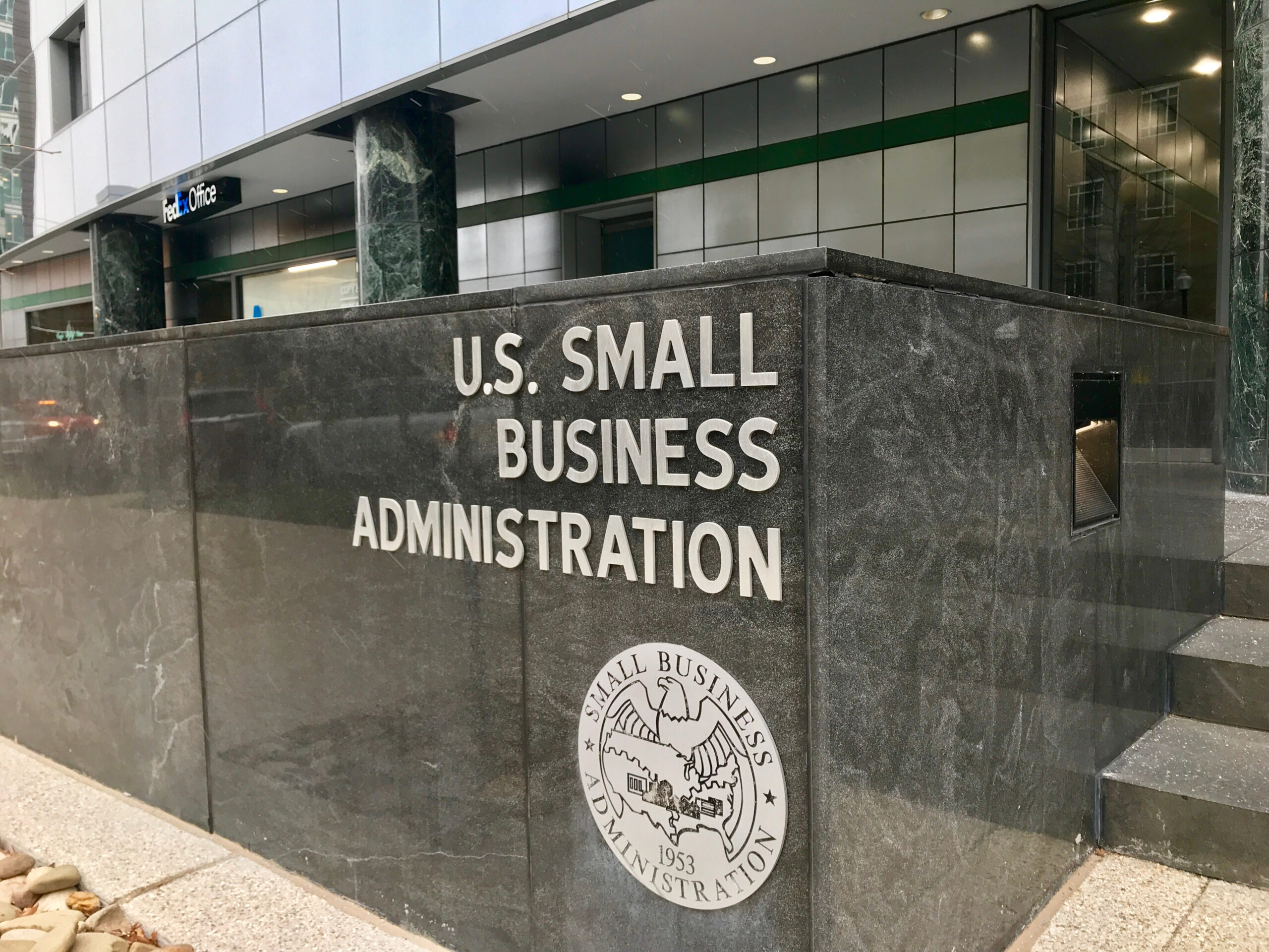 SBA SMALL BUSINESS ADMINISTRATION sign emblem seal at headquarters building entrance. SBA is the government agency that provides support to small businesses.